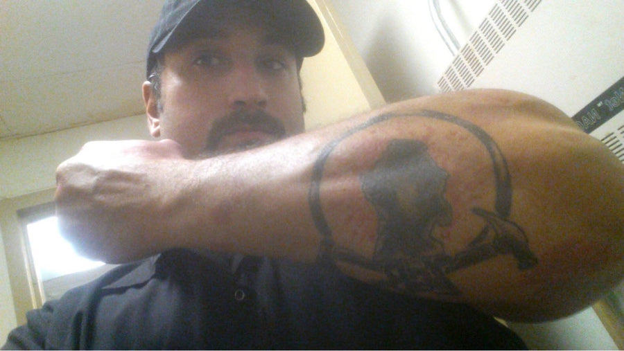 ZGB fan showing a Zombie Go Boom tattoo